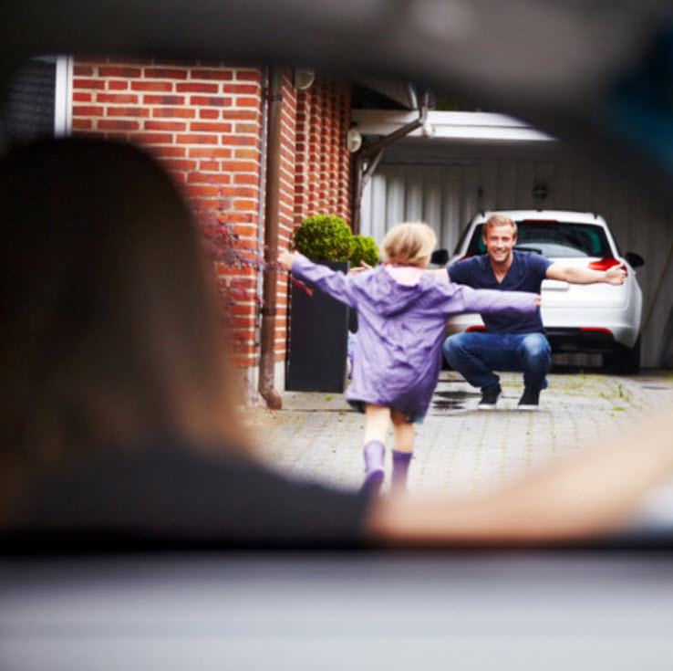 A child running toward a waiting parent