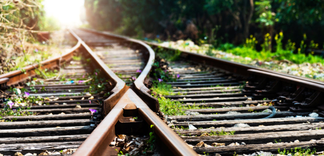 Railroad tracks dividing into different directions